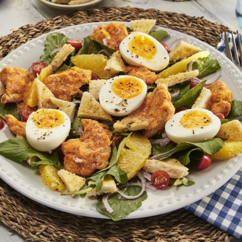 Smoked Paprika Chicken Salad with soft boiled egg and croutons