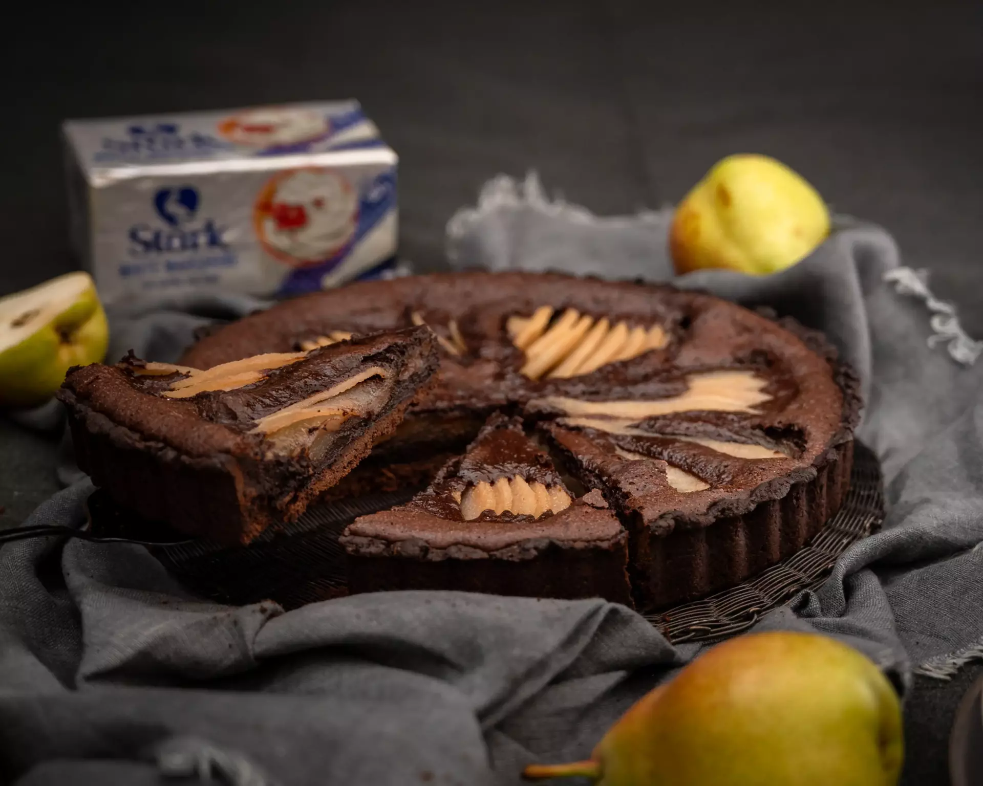 Baked Chocolate and Pear Tart with Caramel Liqueur Sauce - Stork